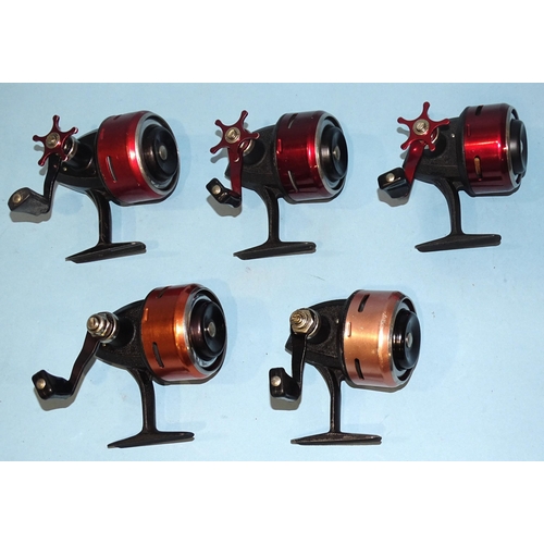 486 - Three Abu 505 castiong reels, finished red, and Abu 503 reel and an Abu 520 reel, (5).... 