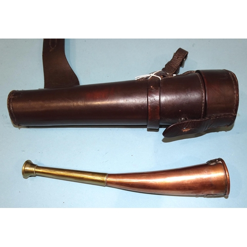 491 - A brass and copper hunting horn, 24cm, in a leather holster marked Scott and Cooper, Bath.... 