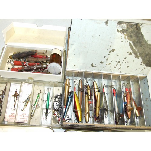 453 - A collection of Devon minnows, lures and spinners, in various japanned and other boxes.... 