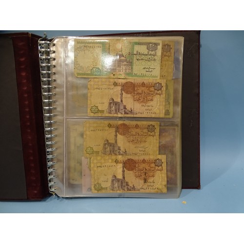 124 - A collection of various British and foreign bank notes contained in an album.