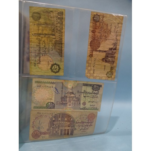 124 - A collection of various British and foreign bank notes contained in an album.