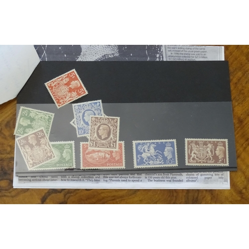 54 - An unusual selection of stamps on stock cards, leaves and loose, including GB 1840 1d black used wit... 