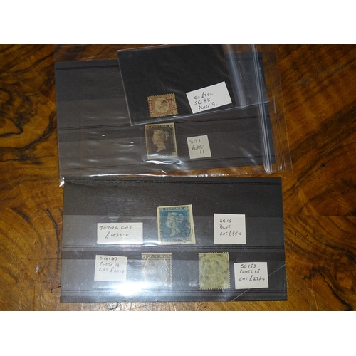 54 - An unusual selection of stamps on stock cards, leaves and loose, including GB 1840 1d black used wit... 