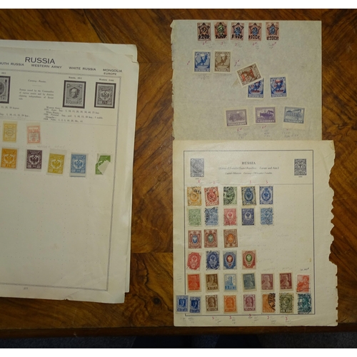 54 - An unusual selection of stamps on stock cards, leaves and loose, including GB 1840 1d black used wit... 