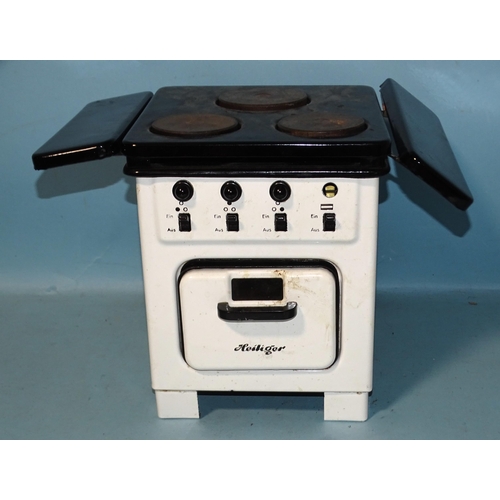 81 - A Heiliger miniature enamelled electric oven, 26.5cm high.