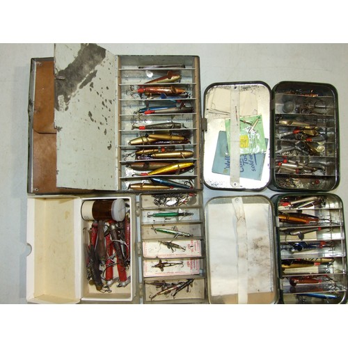 83 - A collection of Devon minnows, lures and spinners, in various japanned and other boxes.... 