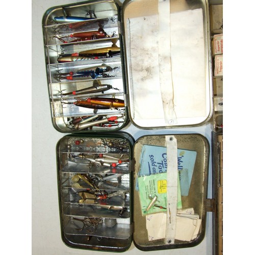 83 - A collection of Devon minnows, lures and spinners, in various japanned and other boxes.... 