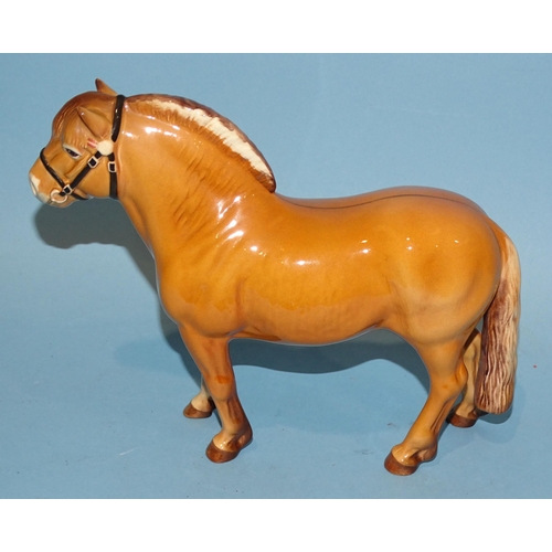 26 - A Beswick Norwegian fjord horse, dun gloss, printed mark beneath, 16cm high.