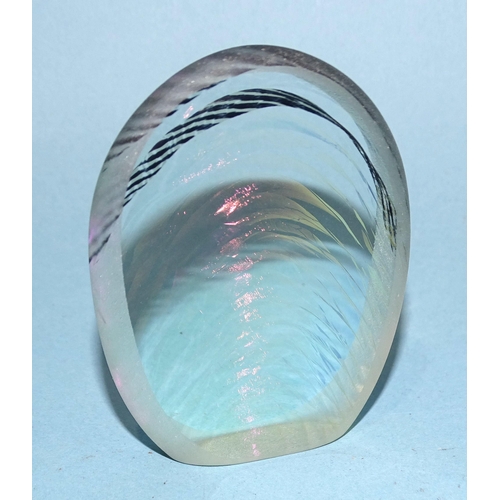 33 - Brian Blanthorn, an iridescent glass pebble decorated with a series of curves, 6.5 x 5.5cm.... 