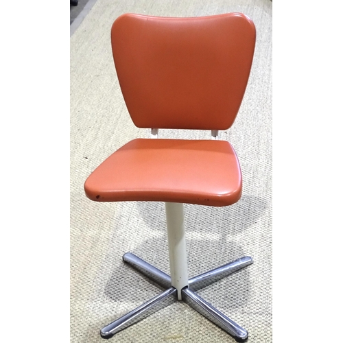 38 - A 1970's metal-framed machinist's chair, with orange plastic-covered seat and back, on chrome star s... 