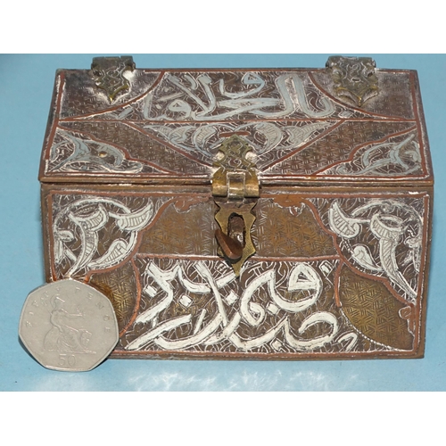 104 - An antique silver and copper inlay Cairo ware trinket box in the form of a chest, 10cm wide, 5.5cm h... 