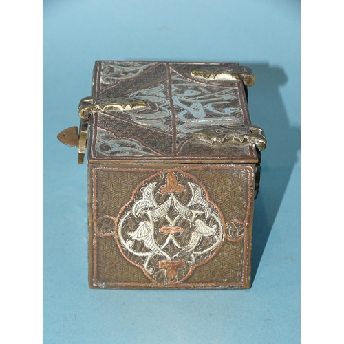 104 - An antique silver and copper inlay Cairo ware trinket box in the form of a chest, 10cm wide, 5.5cm h... 