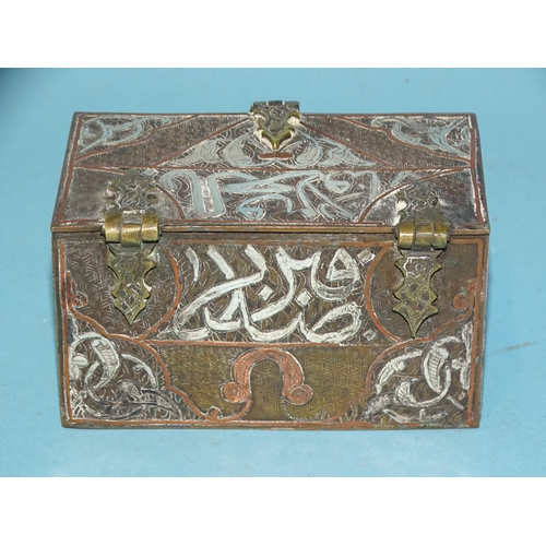 104 - An antique silver and copper inlay Cairo ware trinket box in the form of a chest, 10cm wide, 5.5cm h... 