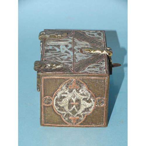 104 - An antique silver and copper inlay Cairo ware trinket box in the form of a chest, 10cm wide, 5.5cm h... 