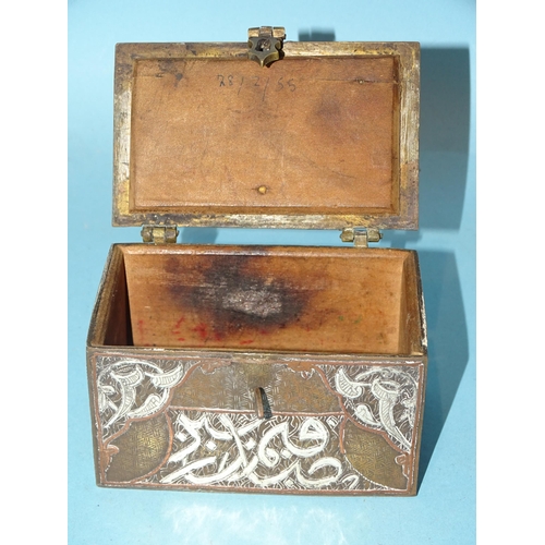 104 - An antique silver and copper inlay Cairo ware trinket box in the form of a chest, 10cm wide, 5.5cm h... 