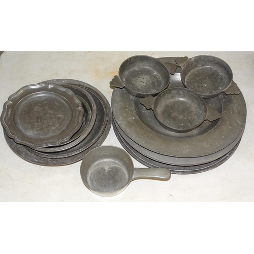 108 - Five large 19th century pewter chargers, 44cm diameter, a three-handled dish, 25cm and other pewter ... 