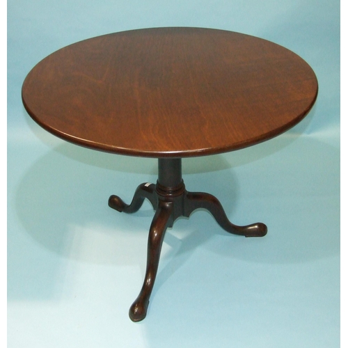 11 - *Please note, all starred lots are sold at no reserve.*A George III mahogany tilt-top table on swept... 