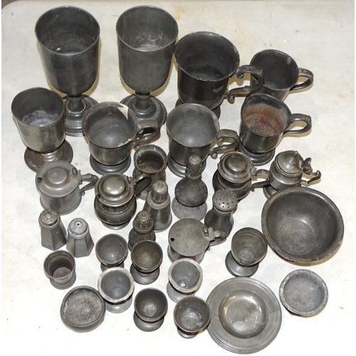 110 - Three antique pewter wine goblets, various footed mugs, lidded mustards, etc.