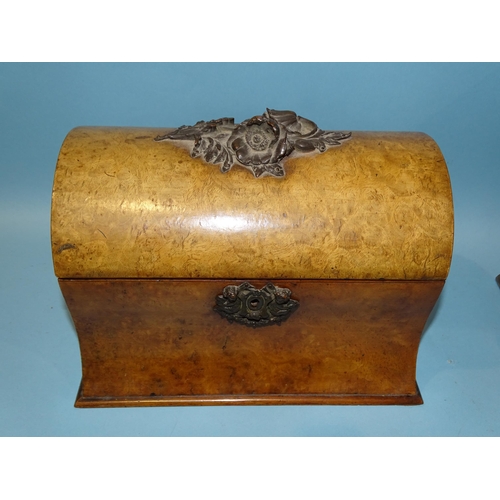 116 - A late-Victorian carved domed walnut stationery box with fitted interior, 24cm wide and an African c... 