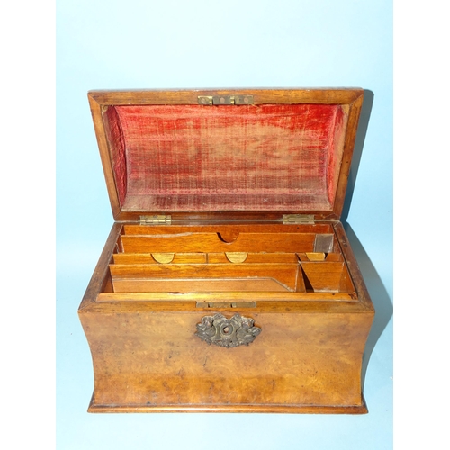 116 - A late-Victorian carved domed walnut stationery box with fitted interior, 24cm wide and an African c... 