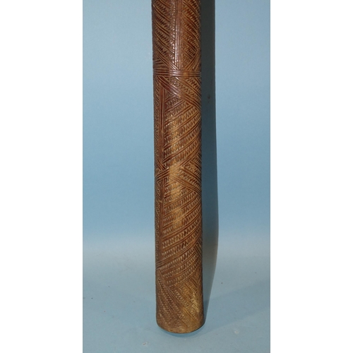 133 - A Polynesian Aku Pouai iron wood pole club of slightly-tapering form, with overall zigzag carved dec... 