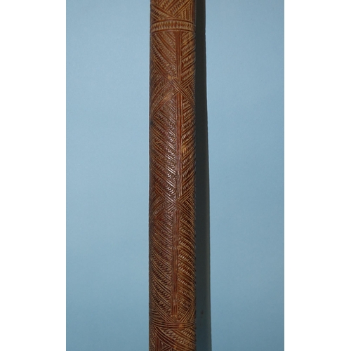 133 - A Polynesian Aku Pouai iron wood pole club of slightly-tapering form, with overall zigzag carved dec... 