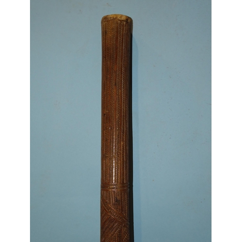 133 - A Polynesian Aku Pouai iron wood pole club of slightly-tapering form, with overall zigzag carved dec... 