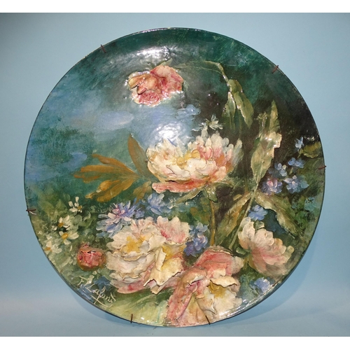 149 - Felix Lafond, a large circular glazed pottery charger decorated with flower heads in relief, 55cm di... 