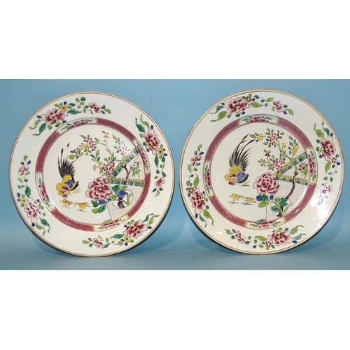 159 - Two late-19th century Continental circular plates decorated with cockerel and chicks amongst floweri... 