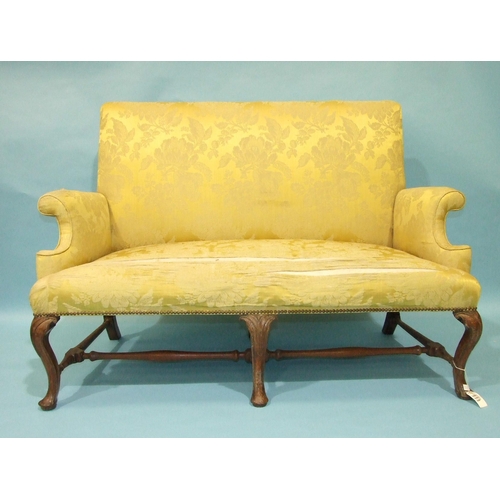 18 - *Please note, all starred lots are sold at no reserve.*An 18th century three-seat settee of upholste... 