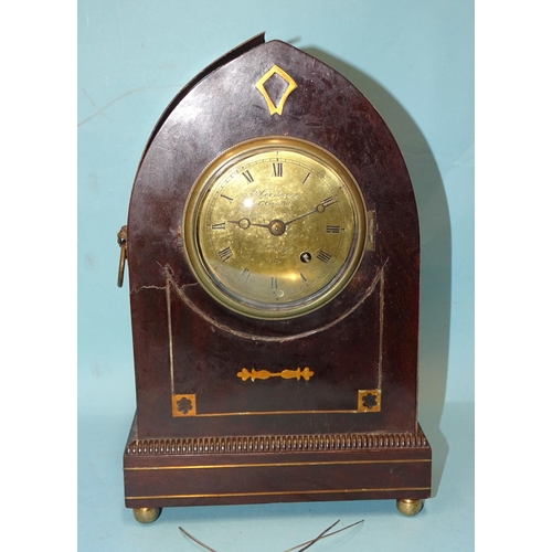 90 - Thomas Cox Savory, 47 Cornhill, London, a 19th century lancet-shaped mantel clock with circular bras... 