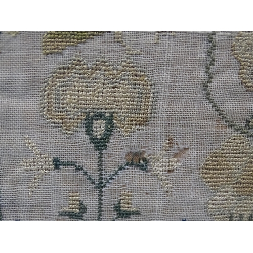 126 - A William IV needlework sampler with central text above a church surrounded by birds, shrubs, flower... 