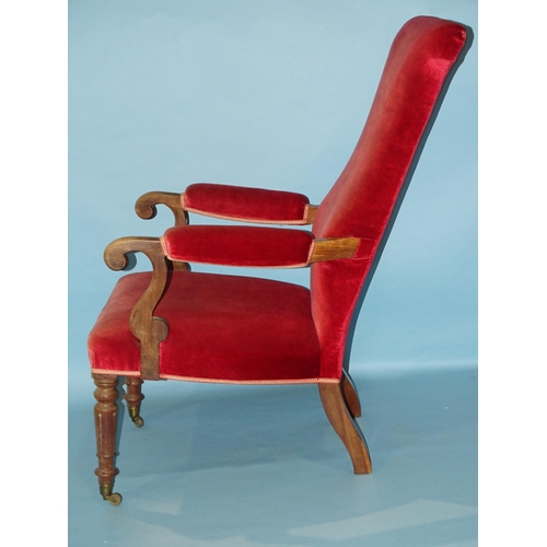 14 - A William IV rosewood salon chair with upholstered back and seat, on carved and turned front legs wi... 