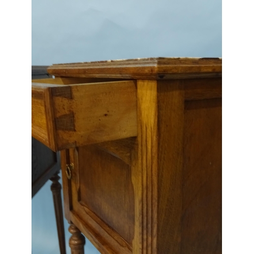 25 - A pair of late-19th century walnut French pot cupboards, each with marble top, single drawer and por... 