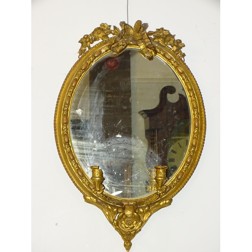 4 - *Please note, all starred lots are sold at no reserve.*An oval gilt gesso girandole, 70 x 46cm and a... 