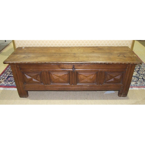 26 - An antique Continental elm coffer with metal-studded detail and panelled front, 182cm long, 60cm hig... 