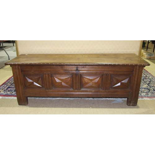 26 - An antique Continental elm coffer with metal-studded detail and panelled front, 182cm long, 60cm hig... 