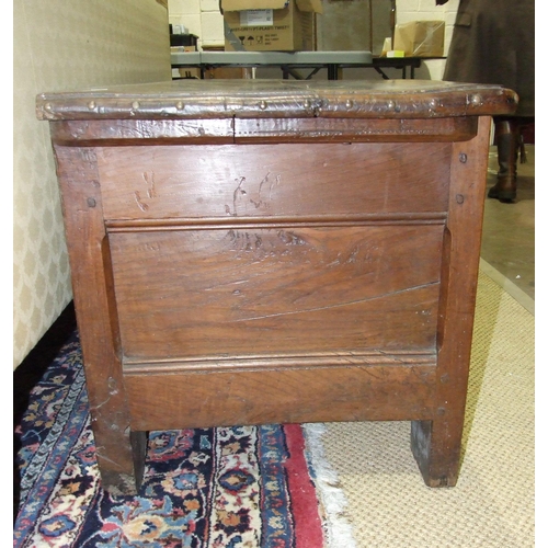 26 - An antique Continental elm coffer with metal-studded detail and panelled front, 182cm long, 60cm hig... 