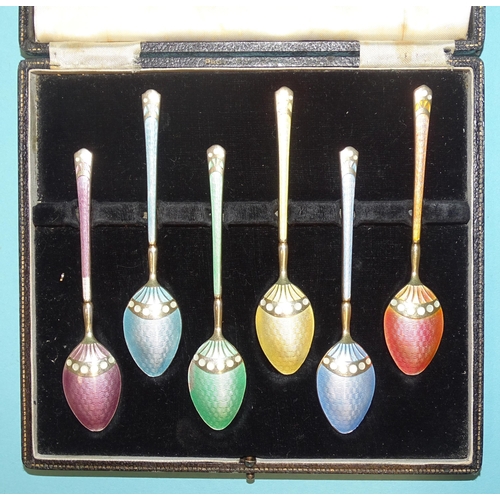 520 - A set of six silver coffee spoons with coloured enamelled handles and underside of bowls, Birmingham... 