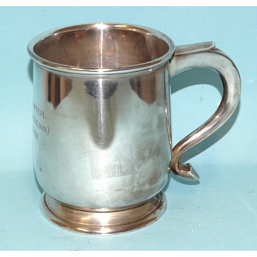 572 - A silver tankard of plain form with inscription, Birmingham 1936, 11cm high, 326.4g, ___10.5oz, (one... 