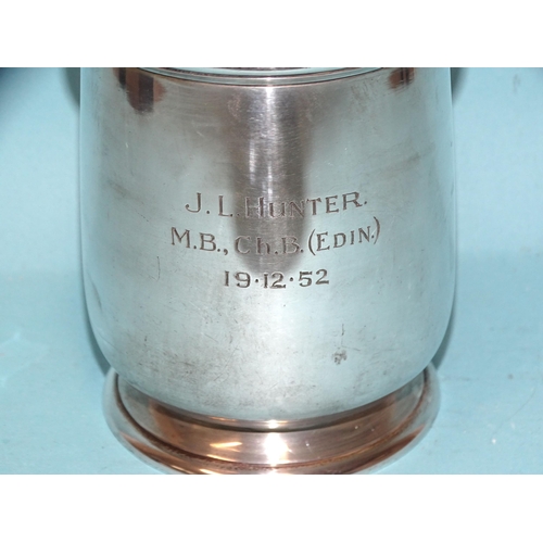 572 - A silver tankard of plain form with inscription, Birmingham 1936, 11cm high, 326.4g, ___10.5oz, (one... 