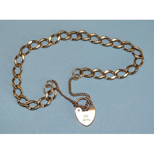 804 - A 9ct gold curb-link bracelet with padlock clasp, 19cm, 7.8g.