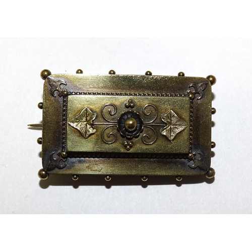 821 - A Victorian good-quality locket-back brooch of rectangular form, with cannetile decoration, unmarked... 