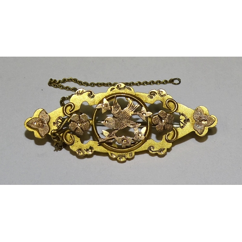 824 - A small Victorian two-tone gold brooch with pierced and engraved bird and flower decoration, 4cm, (b... 