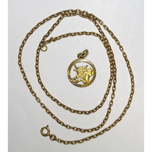 825 - WITHDRAWN: A 9k gold Taurus pendant on 9ct gold chain, 50cm, 6.8g.