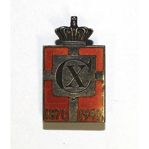 830 - Georg Jensen, a Danish silver and enamel badge with enamelled Danish flag, central 'CX' for King Chr... 