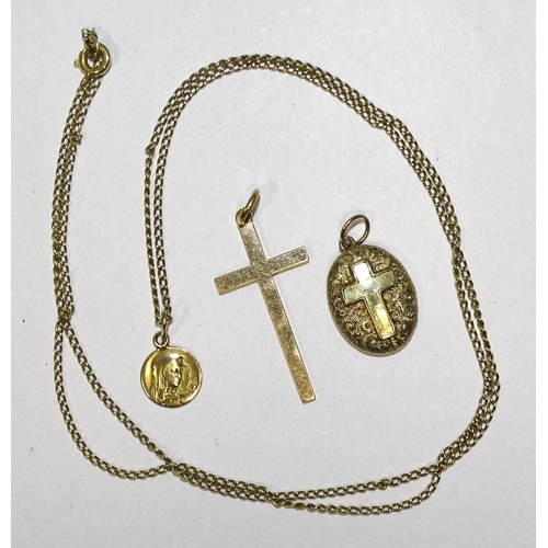 929 - A small gold religious pendant, (tests as 18ct approximately), on unmarked curb-link chain, tests as... 