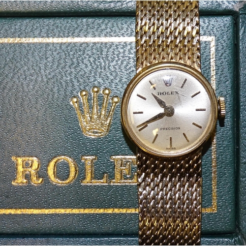 707 - A lady's Rolex Precision wrist watch, the circular silvered dial with baton numerals, the cal.1404 m... 