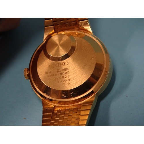 697 - Seiko, a 1970's quartz V.F.A. 18ct gold wrist watch, 3823-5005, the oval textured dial with baton nu... 