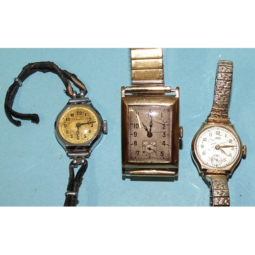 699 - A vintage 9ct gold rectangular tank-cased wrist watch, the silvered dial with Arabic numerals and se... 